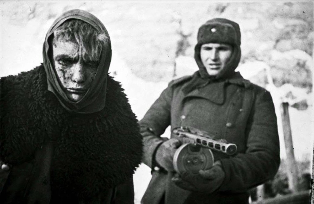 German POW held by a Soviet guardsman at the end of the Stalingrad encirclement